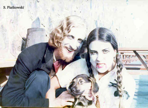 [Mortician, Lizzie, and Dog]