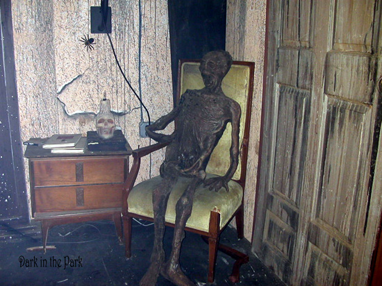 [corpse in chair]